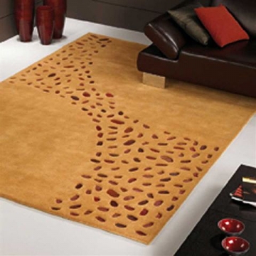 tapis loxton ocre à motifs en peaux carving