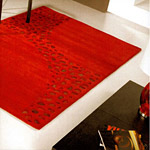 tapis loxton à motifs en peaux rouge - carving